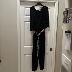 Brand new black jumpsuit with belt and tags